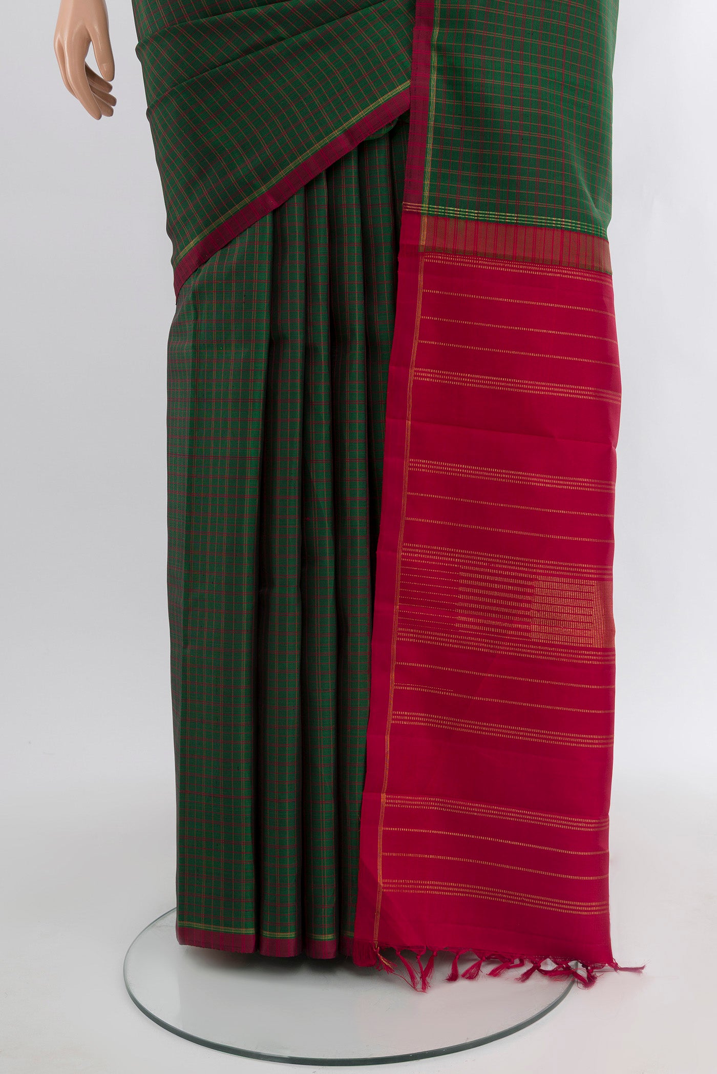 Pleats and pallu of Pure Silk Pure Zari Bottle Green Kanjivaram Saree with Checked design on the body and Plain Border. 