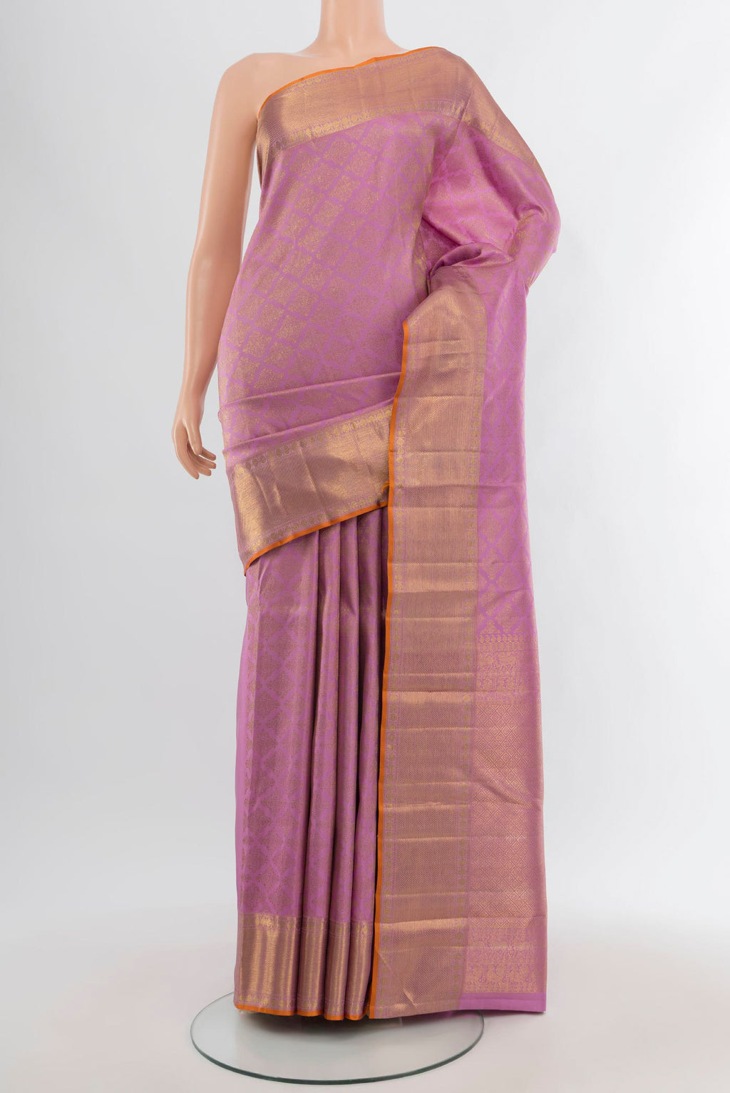 Lavender Kanchipuram Silk Saree with Zari Brocade on the body and Zari Border.  displayed on a mannequin