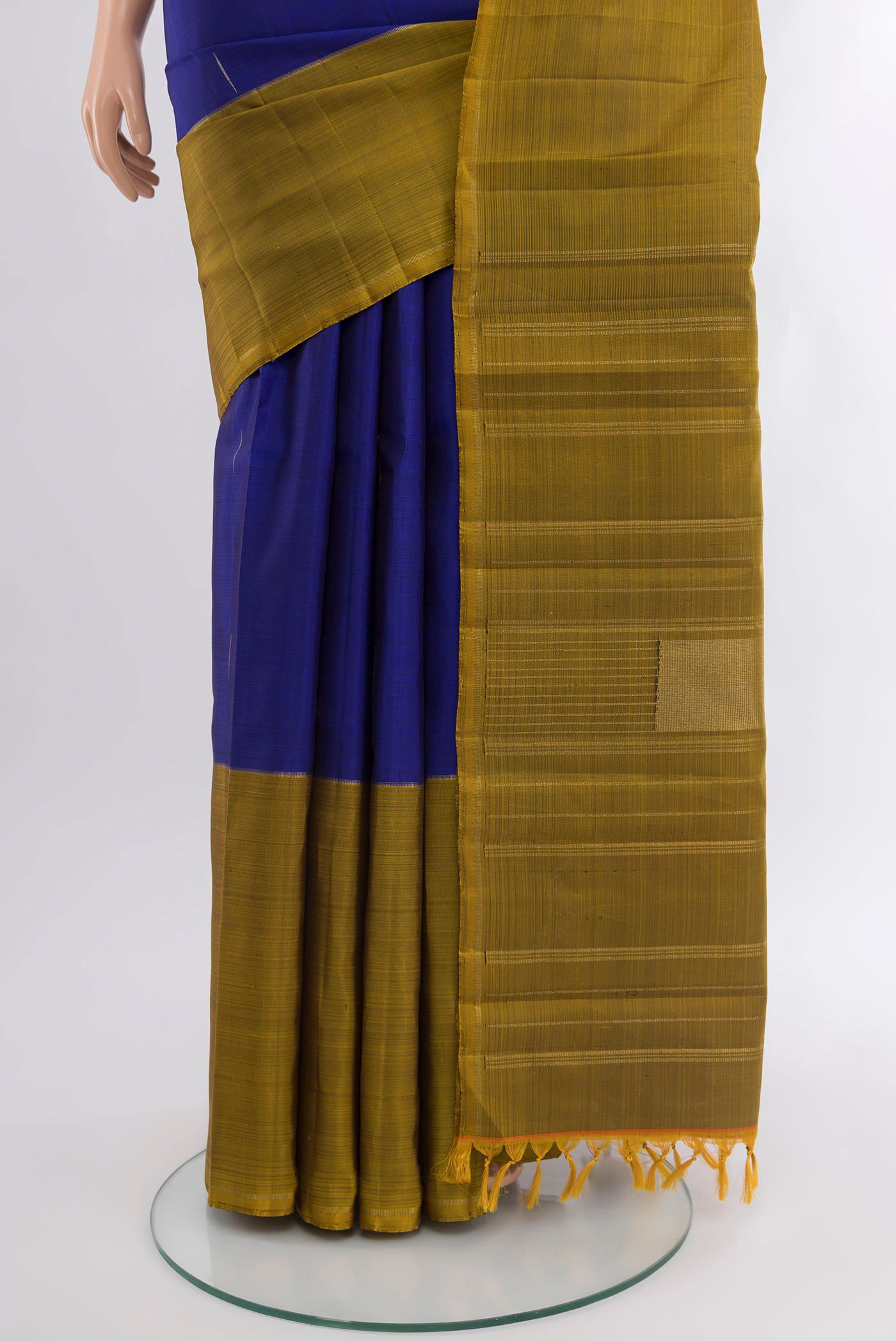 Pleats and pallu of Pure Silk Pure Zari Dark Blue Kanjivaram Saree with Zari Butta on the body and Ganga Jamuna Border. 