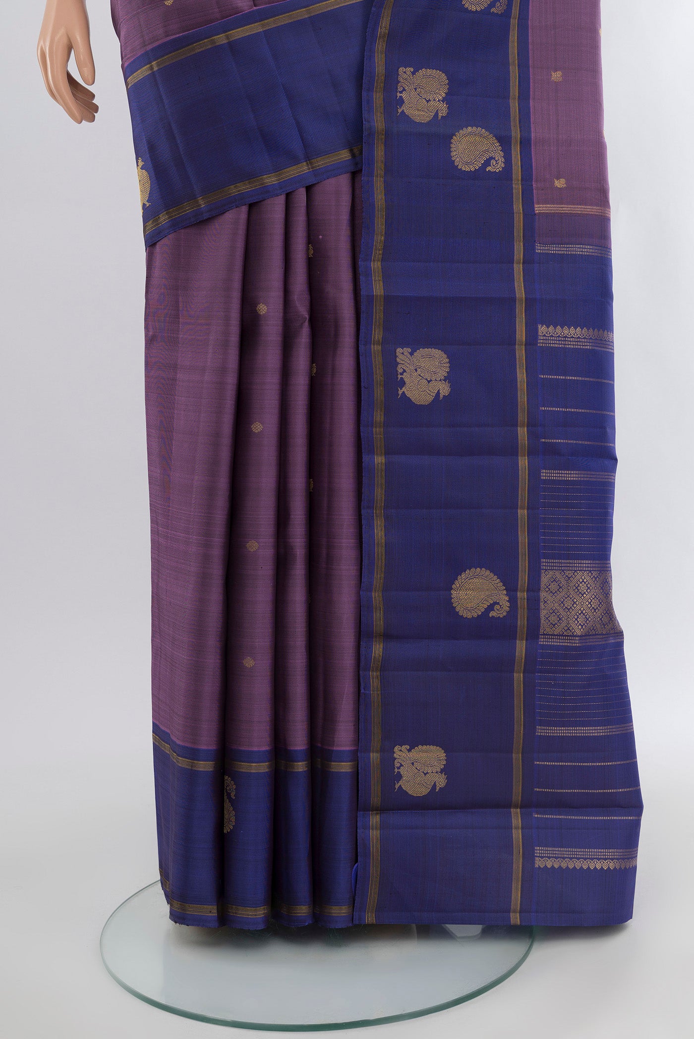 Pleats and pallu of Pure Silk Pure Zari Violet Kanjivaram Saree with Zari Butta on the body and Plain Border. 