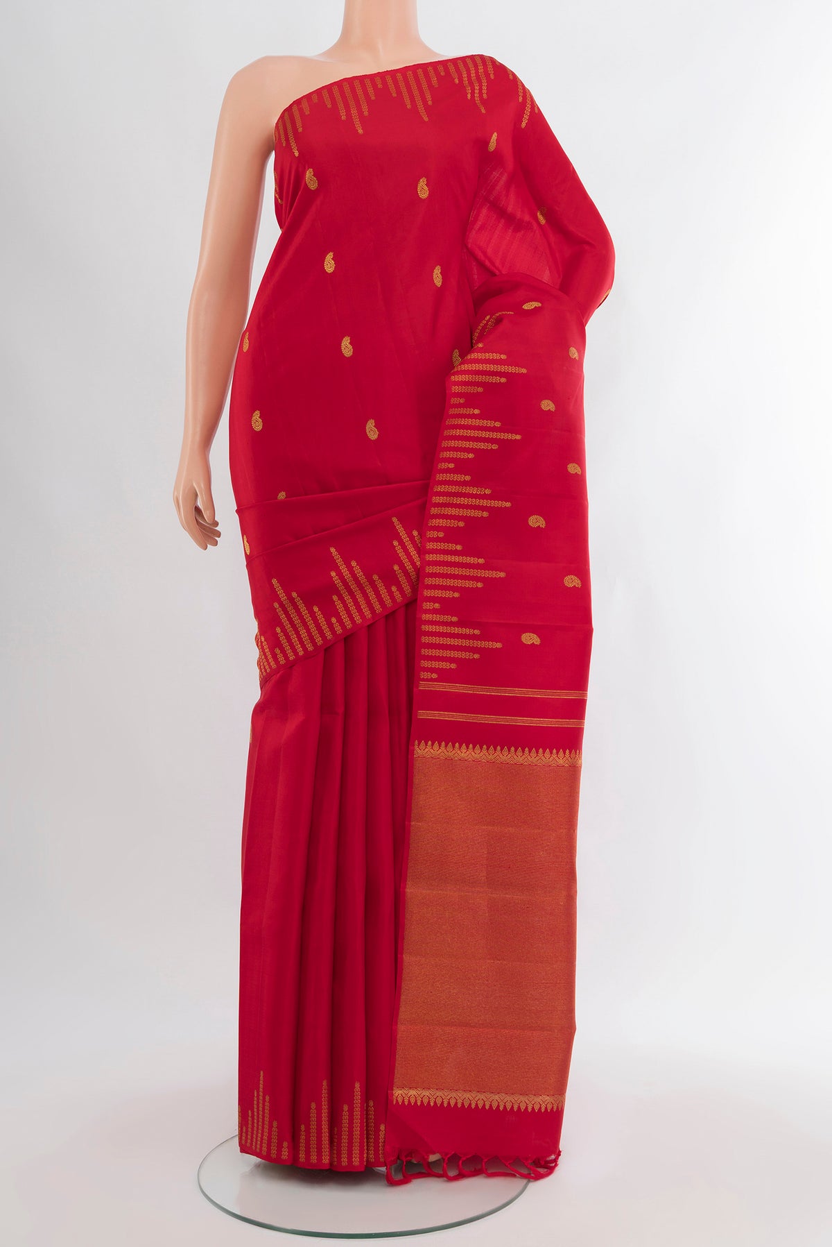 Red Kanchipuram Silk Saree with Zari Butta on the body and Temple Border.  displayed on a mannequin