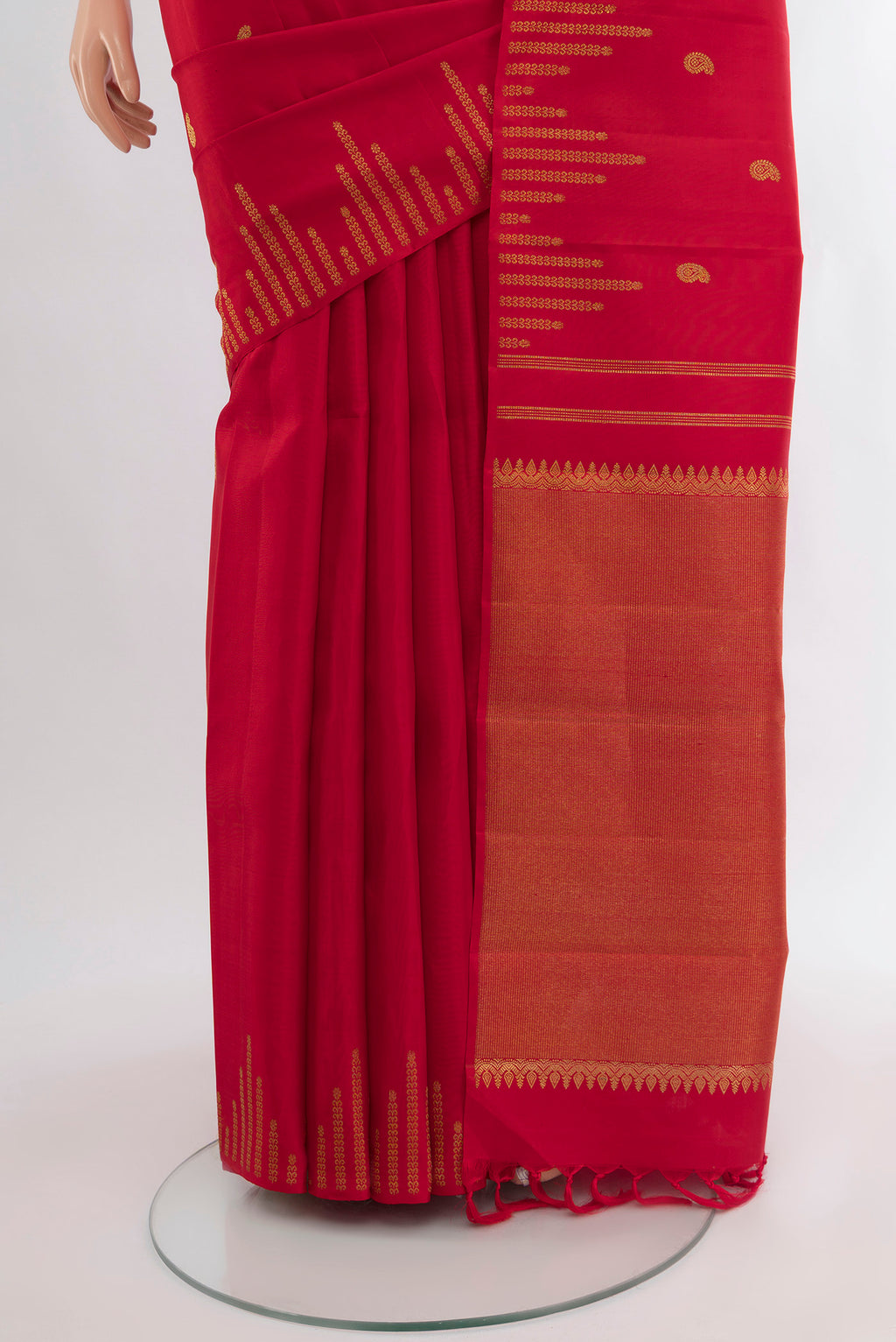 Pleats and pallu of Red Kanchipuram Silk Saree with Zari Butta on the body and Temple Border. 