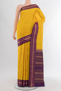 Yellow Kanjivaram Silk Saree with Stripes on the body and Zari Border.  displayed on a mannequin