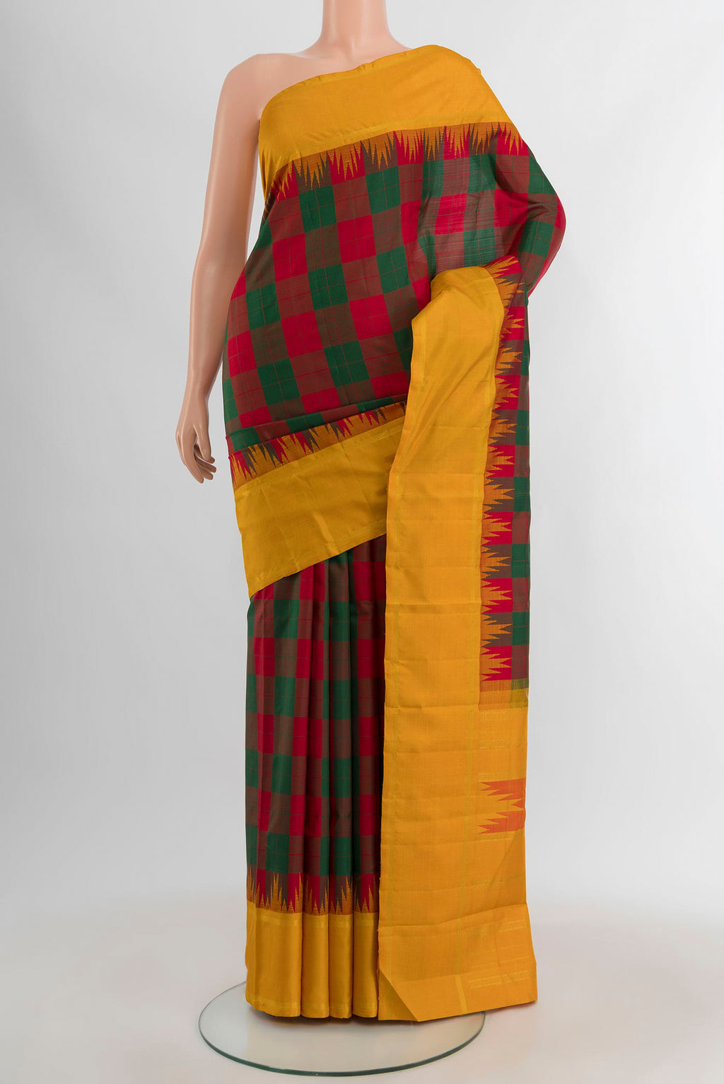 Multi Color Kanjivaram Silk Saree with Checked design on the body and Plain Border.  displayed on a mannequin