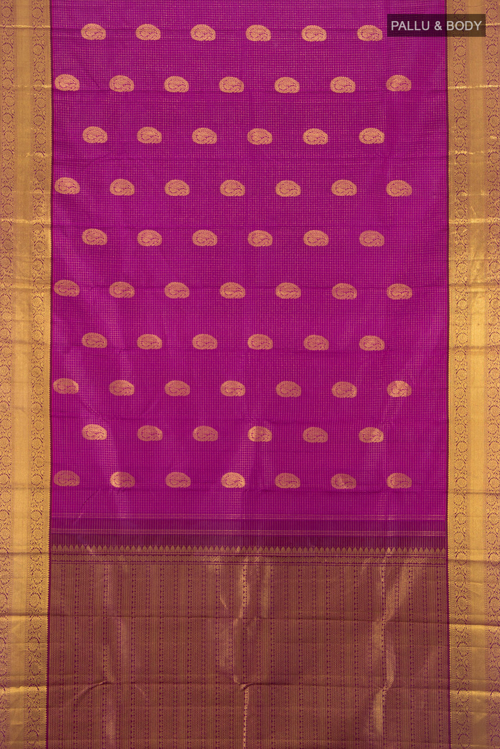 Flat view of Magenta Kanjivaram Silk Saree with Zari Butta on the body and Zari Border. 