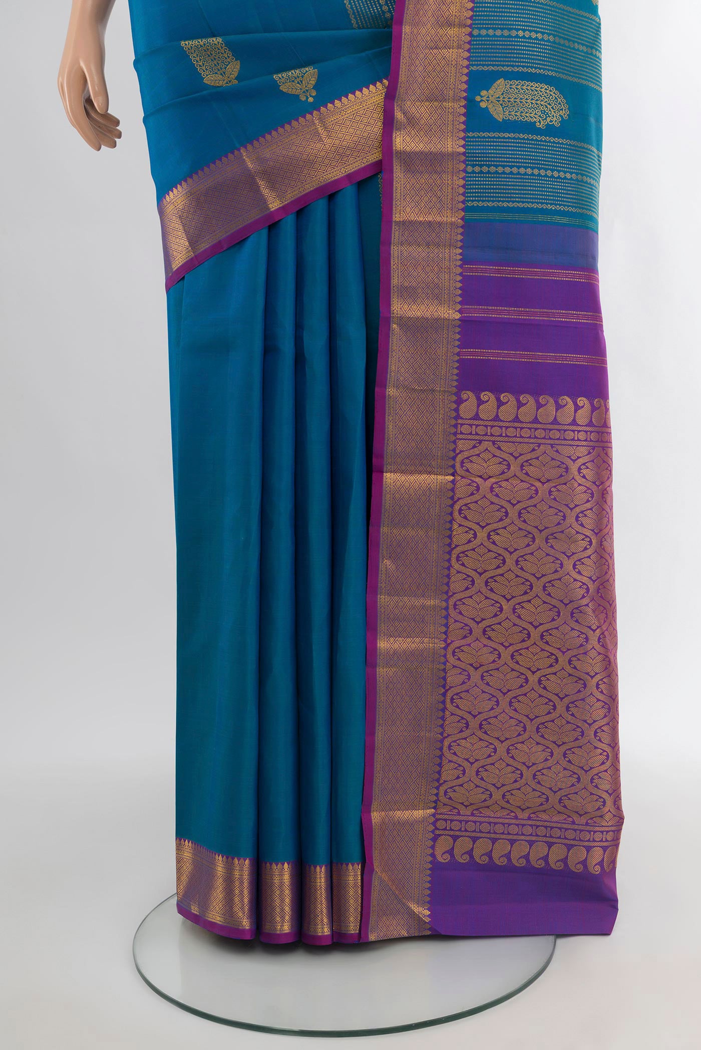 Pleats and pallu of Blue Kanjivaram Silk Saree with Zari Butta on the body and Zari Border. 