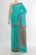 Sky Blue Kanjivaram Silk Saree with Thread Butta on the body and Thread Border.  displayed on a mannequin