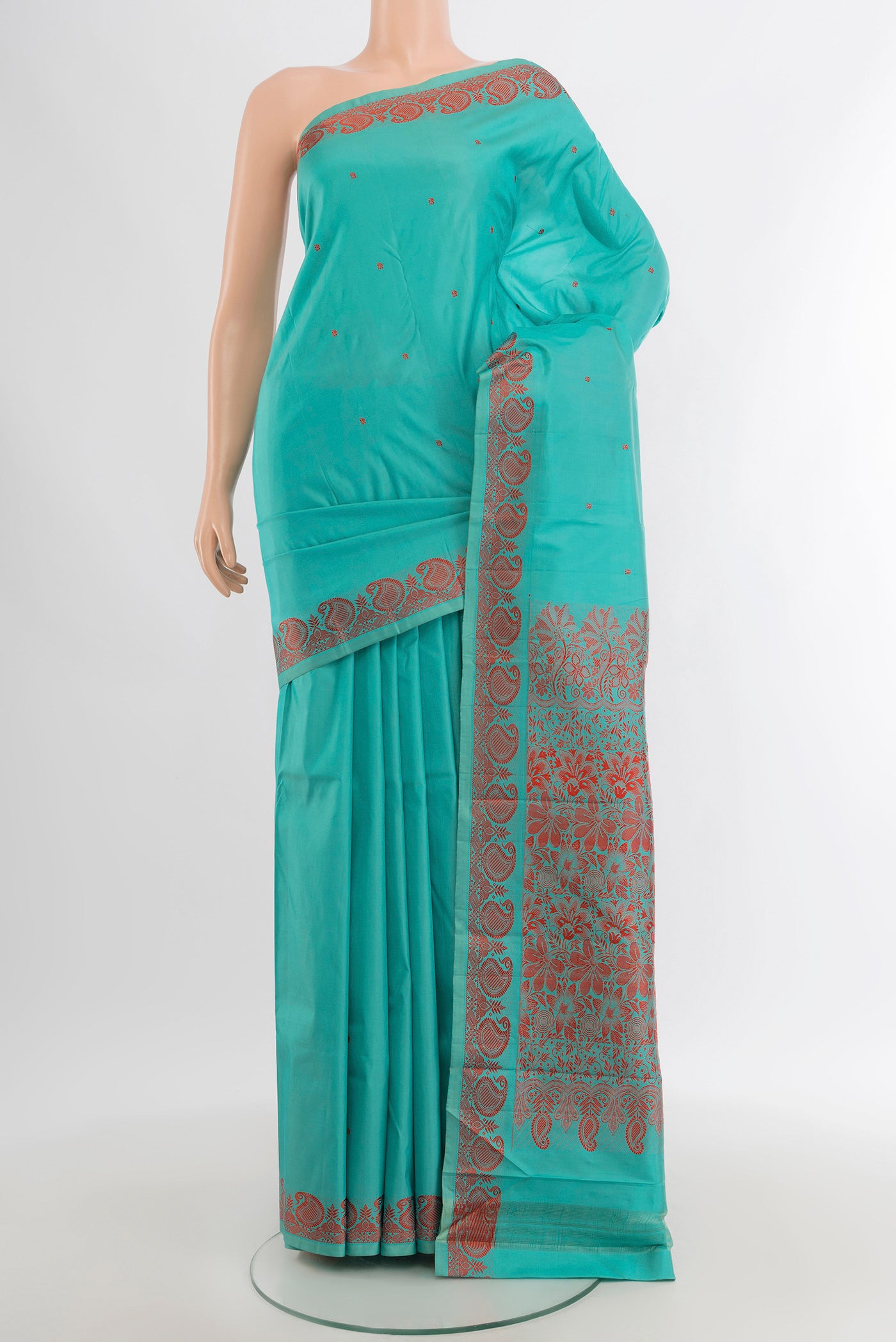 Sky Blue Kanjivaram Silk Saree with Thread Butta on the body and Thread Border.  displayed on a mannequin