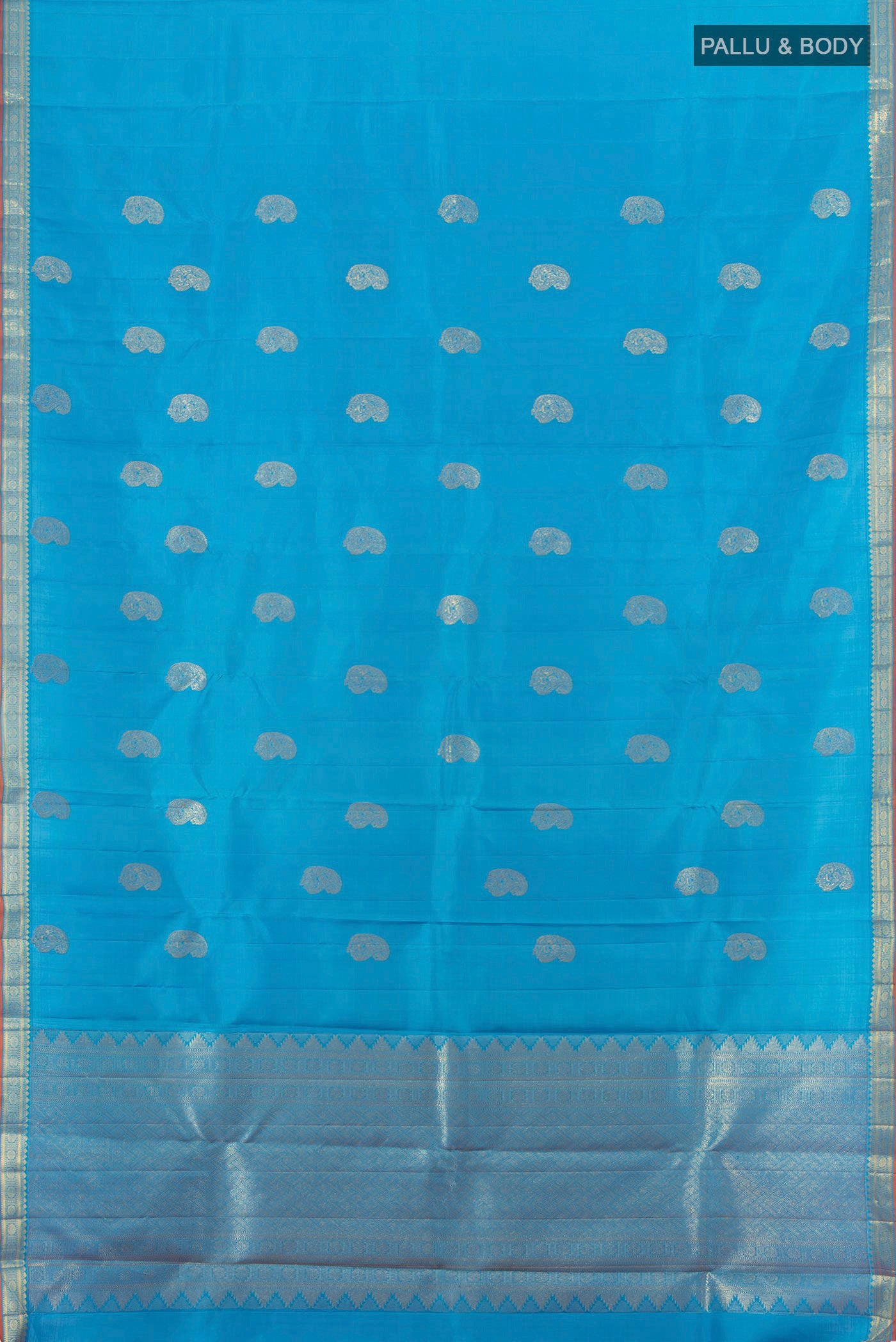 Flat view of Blue Kanchipuram Silk Saree with Zari Butta on the body and Zari Border. 