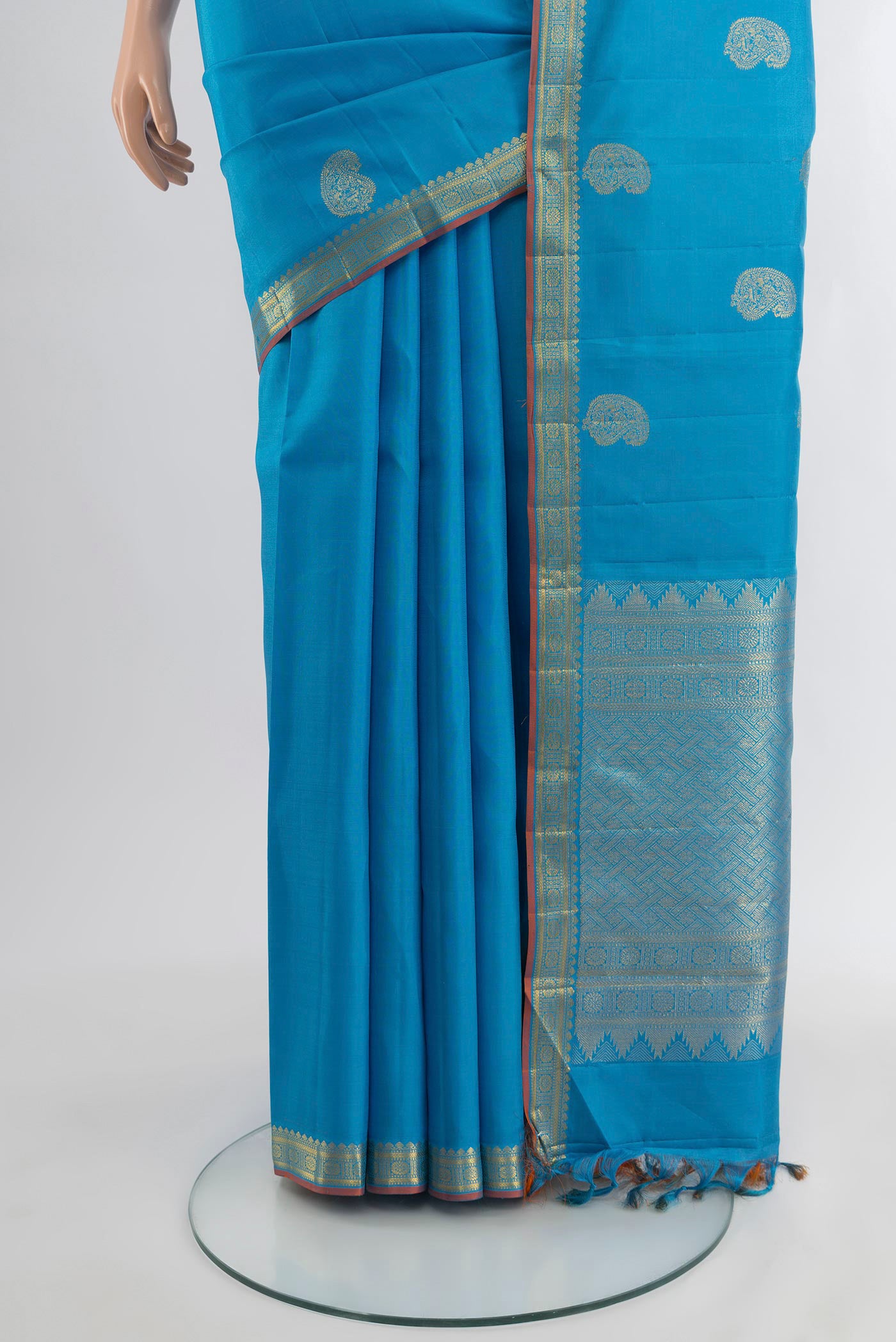 Pleats and pallu of Blue Kanchipuram Silk Saree with Zari Butta on the body and Zari Border. 