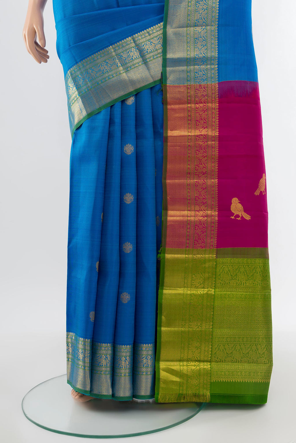 Pleats and pallu of Pure Silk Pure Zari Light Blue Kanchipuram Saree with Zari Butta on the body and Silk Border. 