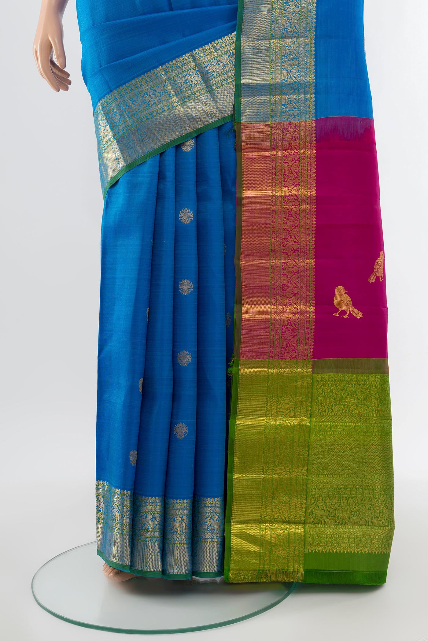 Pleats and pallu of Pure Silk Pure Zari Light Blue Kanchipuram Saree with Zari Butta on the body and Silk Border. 