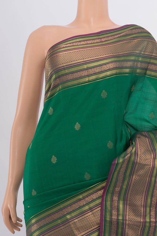 Border image of Peacock Blue Kanchipuram Silk Saree with Zari Butta on the body and Silk Border. 
