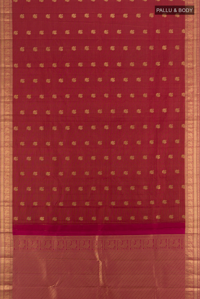 Flat view of Maroon Kanchipuram Silk Saree with Zari Butta on the body and Silk Border. 