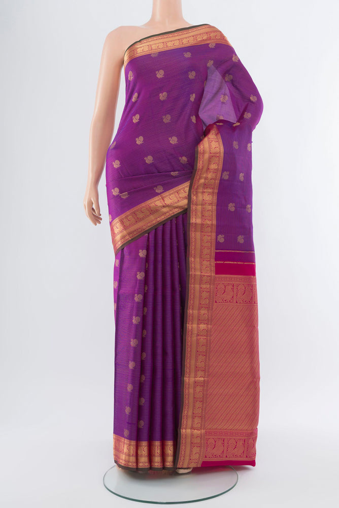 Purple Kanchipuram Silk Saree with Zari Butta on the body and Silk Border.  displayed on a mannequin