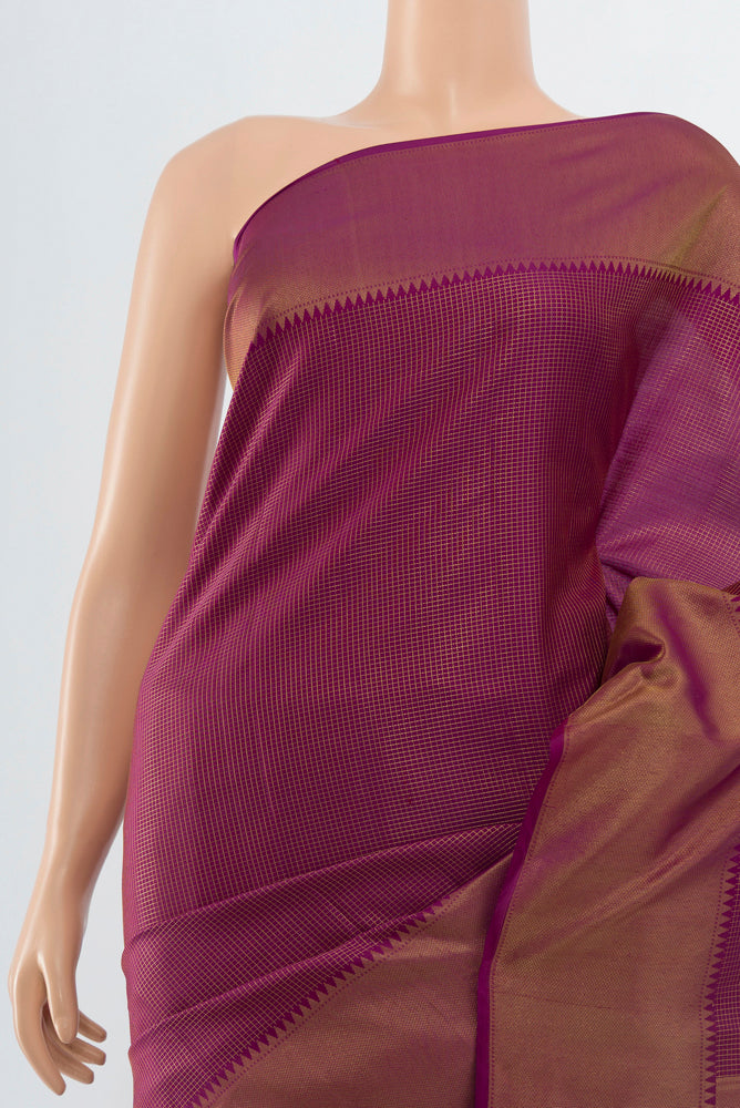 Border image of Purple Kanchipuram Silk Saree with Zari Butta on the body and Silk Border. 