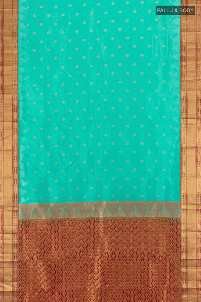 Flat view of Sky Blue Kanchipuram Silk Saree with Zari Butta on the body and Silk Border. 