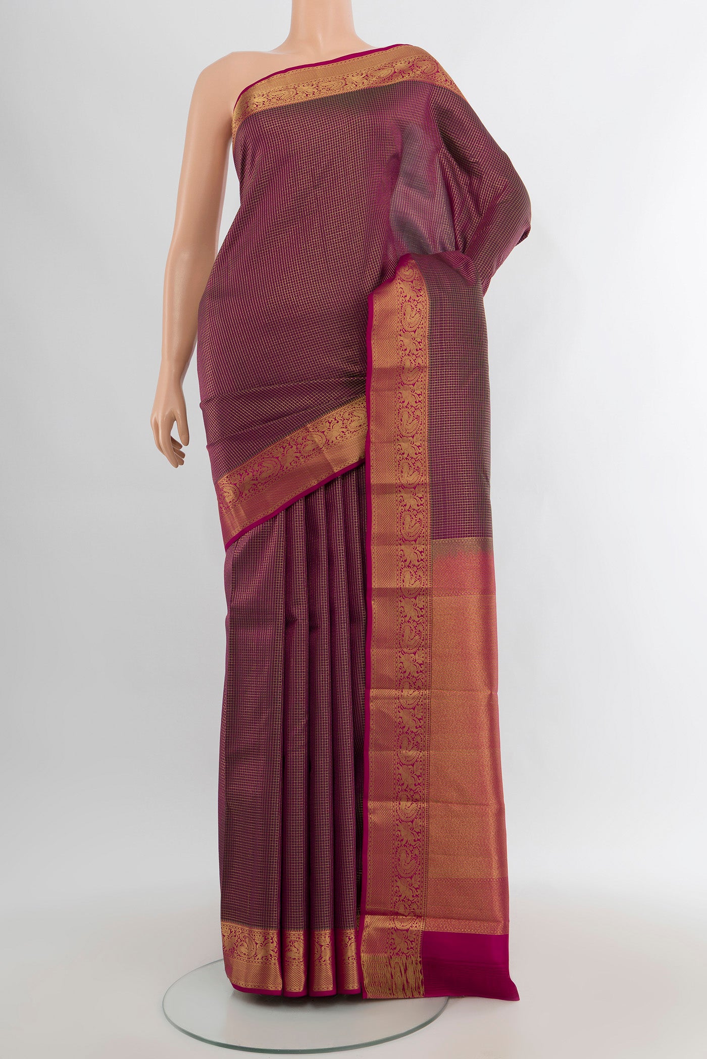 Purple Kanchipuram Silk Saree with Checked design on the body and Zari Border.  displayed on a mannequin