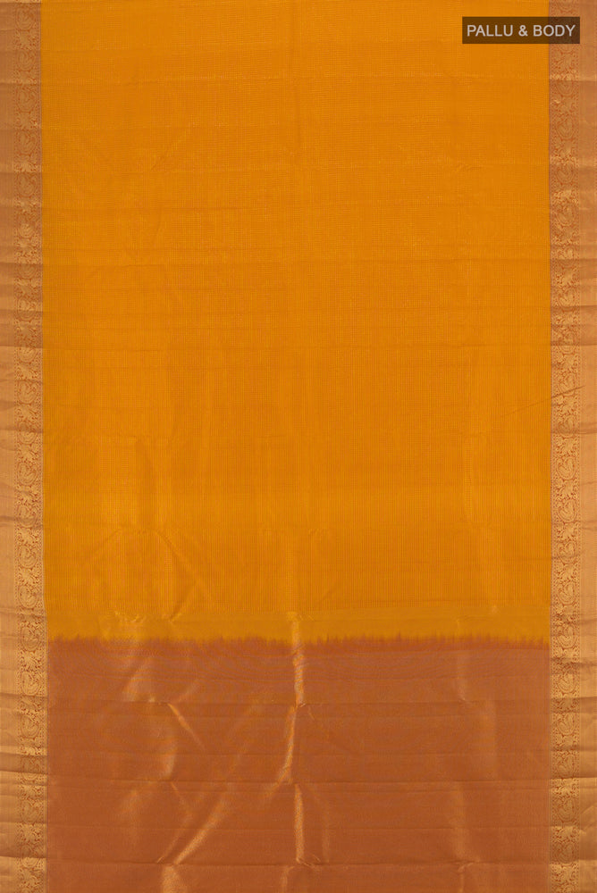 Flat view of Mustard Kanchipuram Silk Saree with Zari Butta on the body and Silk Border. 