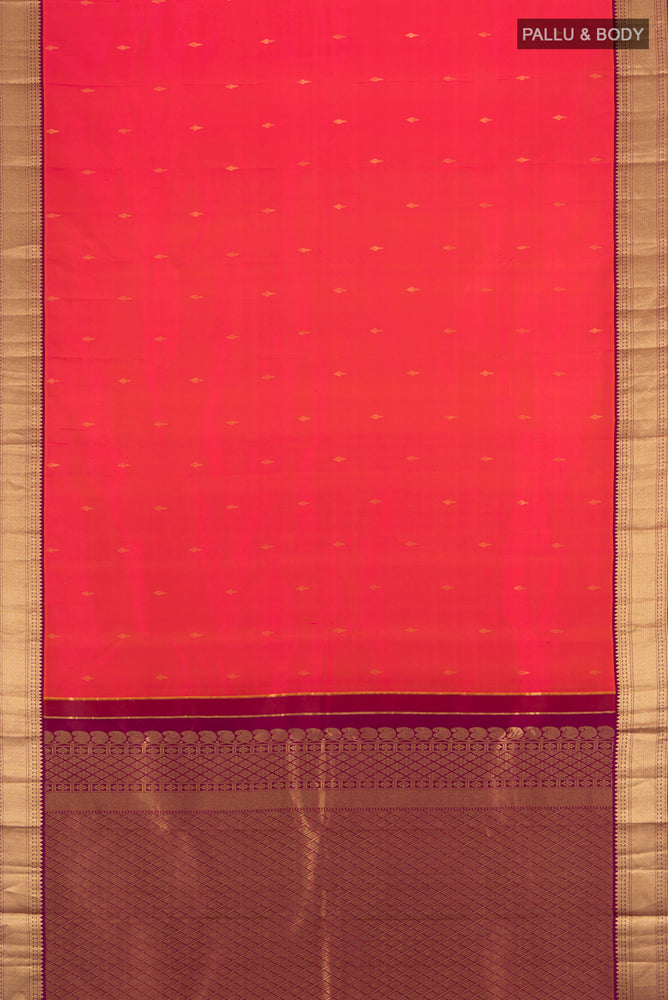 Flat view of Peach Kanchipuram Silk Saree with Plain Body and Silk Border. 