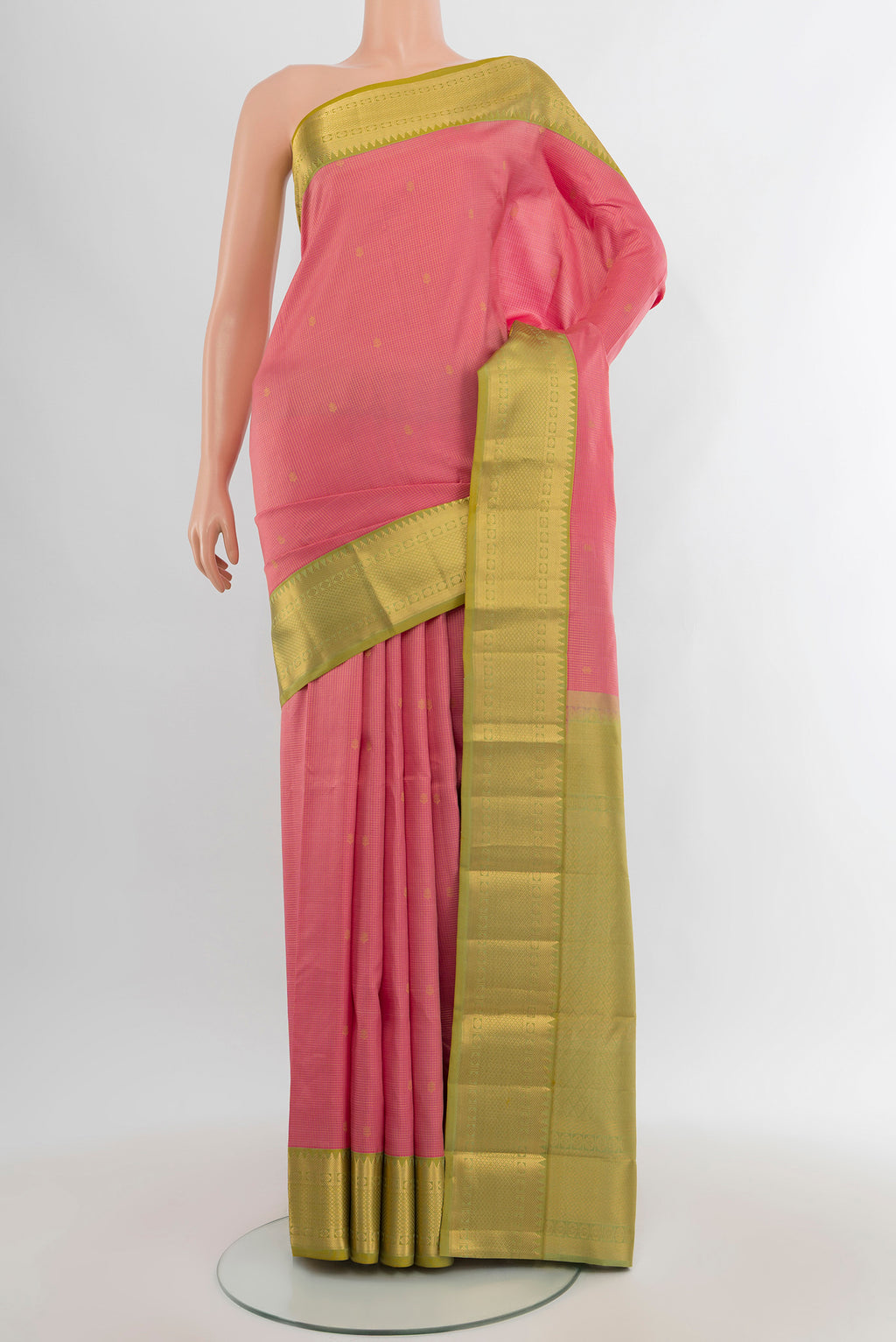 Rose pink Kanjivaram Silk Saree with Zari Butta on the body and Zari Border.  displayed on a mannequin