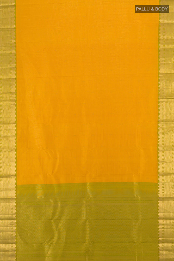 Flat view of Yellow Kanjivaram Silk Saree with Zari Butta on the body and Silk Border. 