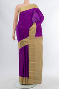 Violet Kanchipuram Silk Saree with Zari Butta on the body and Silk Border.  displayed on a mannequin