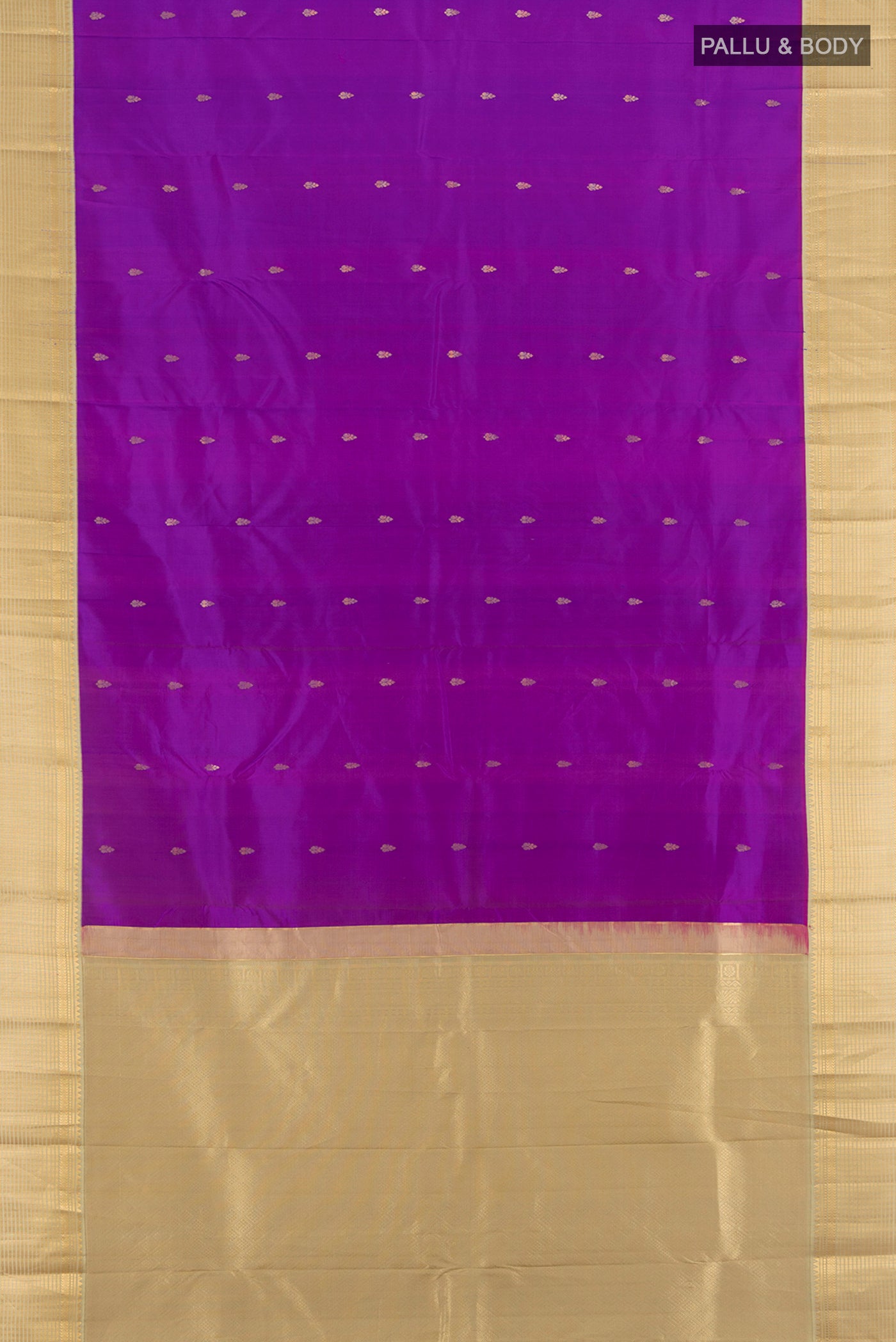 Flat view of Violet Kanchipuram Silk Saree with Zari Butta on the body and Silk Border. 