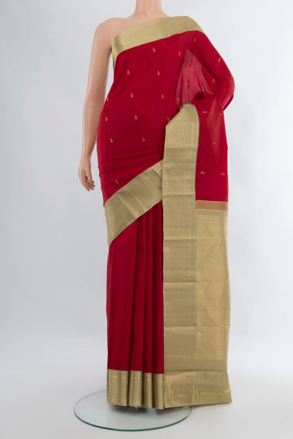Deep Red Kanchipuram Silk Saree with Zari Butta on the body and Zari Border.  displayed on a mannequin