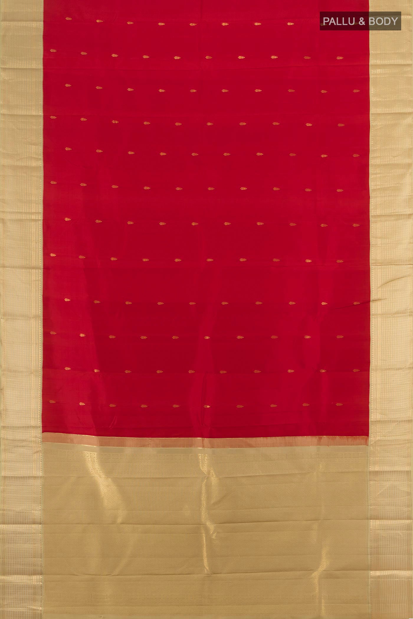 Flat view of Deep Red Kanchipuram Silk Saree with Zari Butta on the body and Zari Border. 