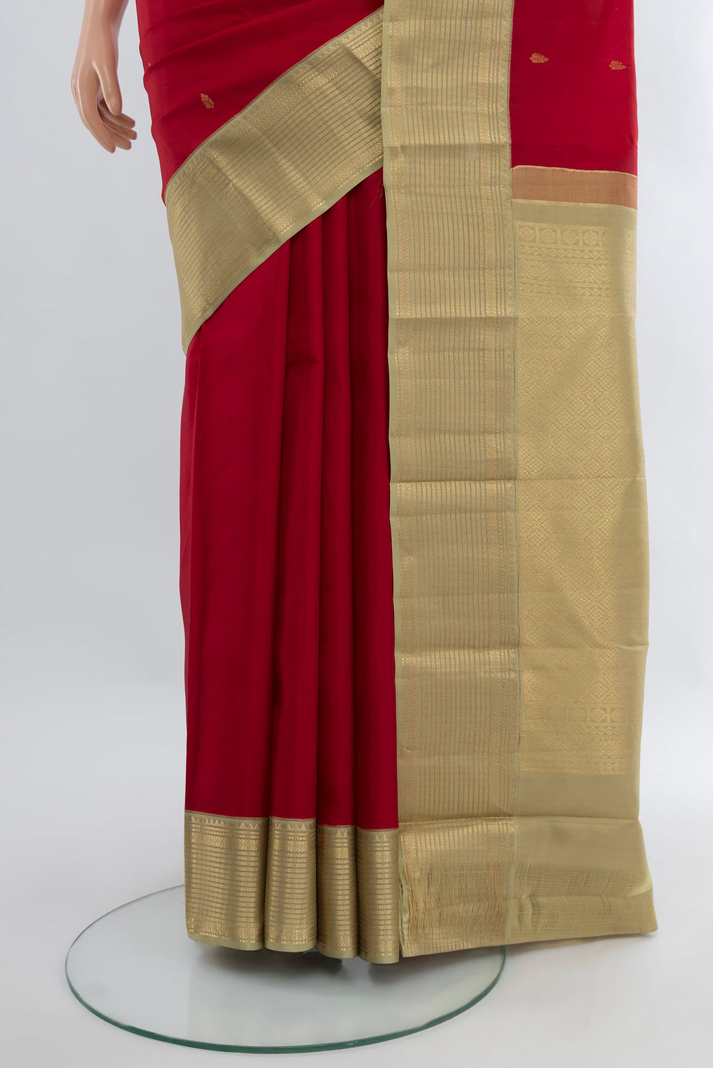 Pleats and pallu of Deep Red Kanchipuram Silk Saree with Zari Butta on the body and Zari Border. 