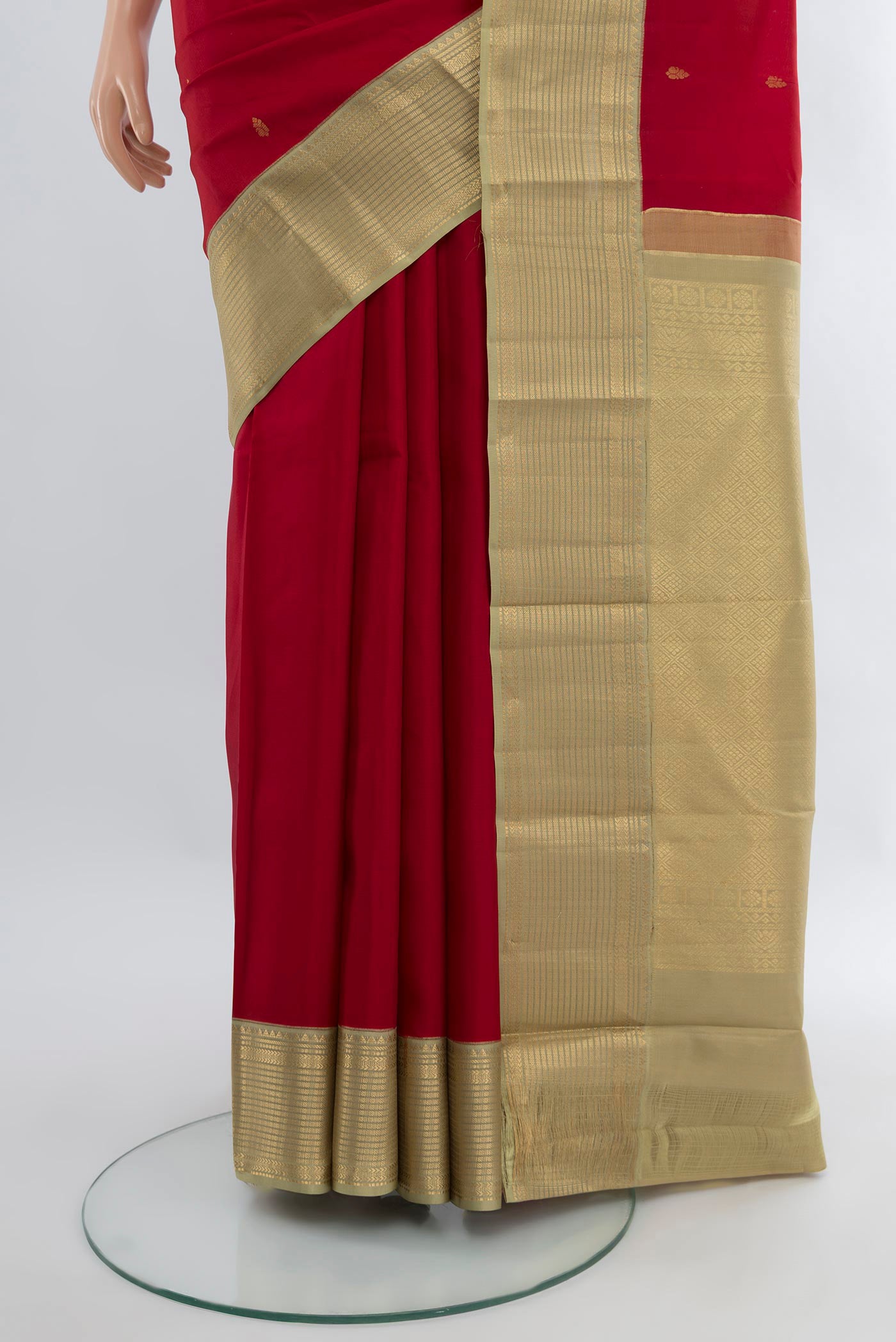 Pleats and pallu of Deep Red Kanchipuram Silk Saree with Zari Butta on the body and Zari Border. 