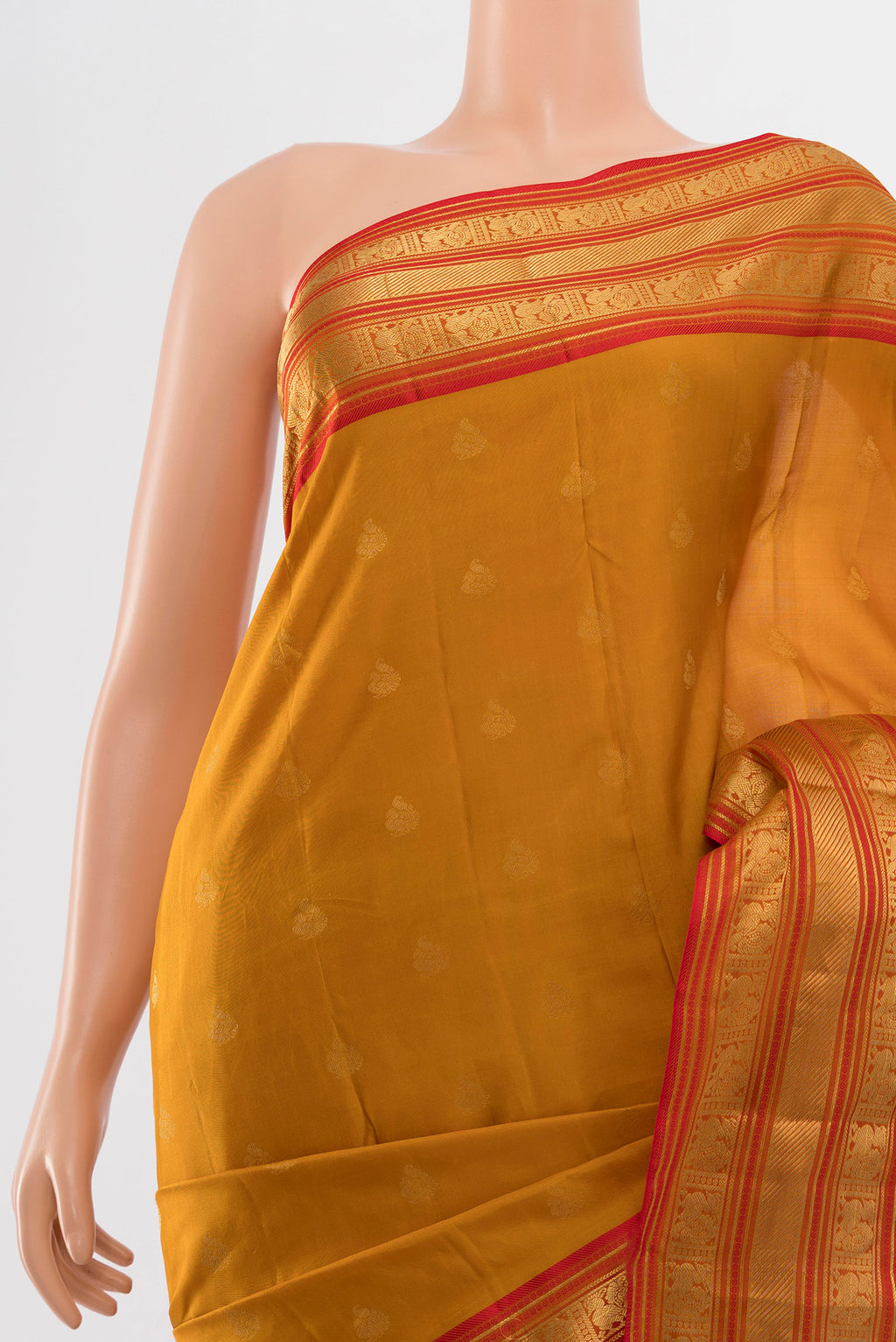 Border image of Pure Silk Pure Zari Mustard Kanchipuram Saree with Zari Butta on the body and Silk Border. 