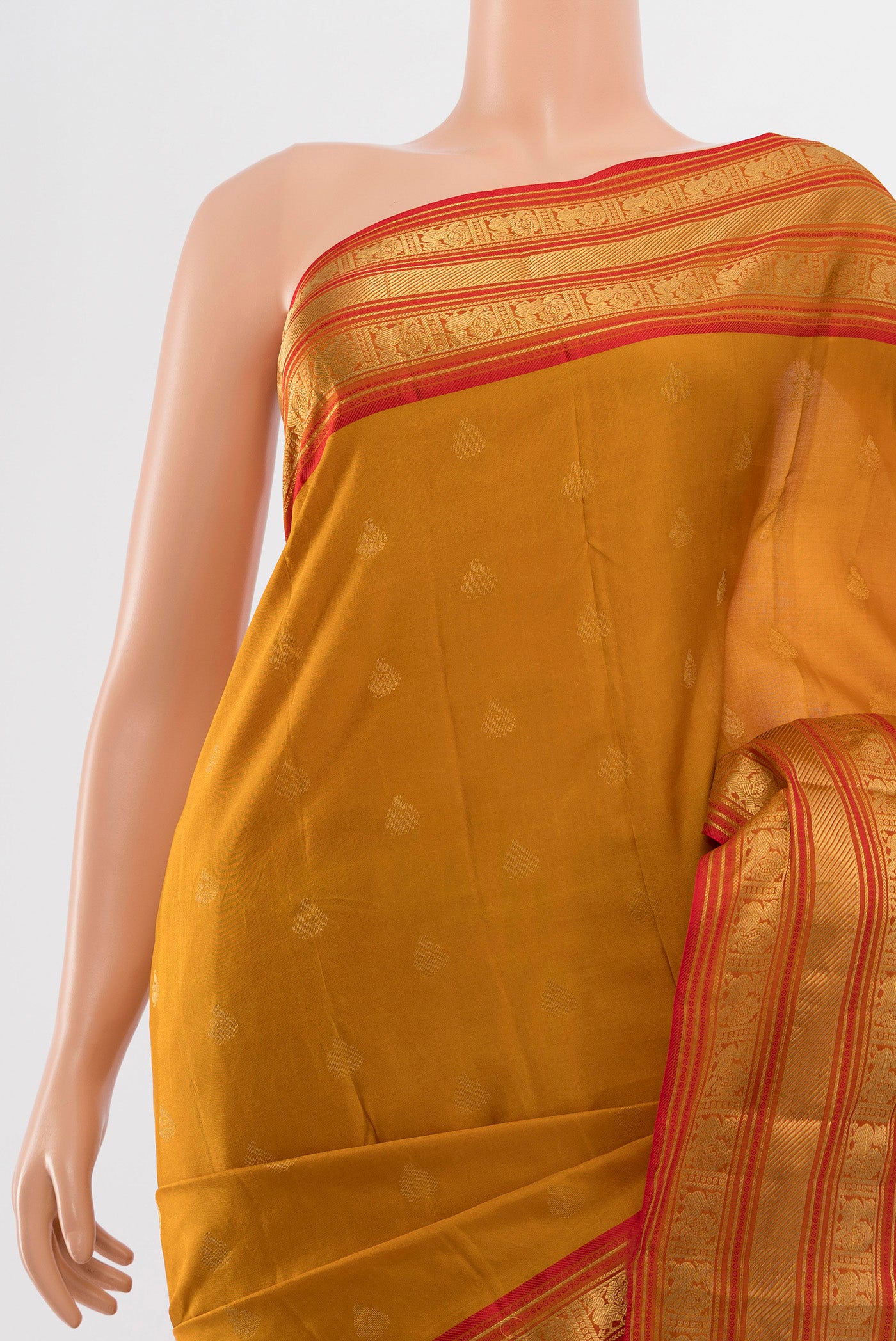 Border image of Pure Silk Pure Zari Mustard Kanchipuram Saree with Zari Butta on the body and Silk Border. 