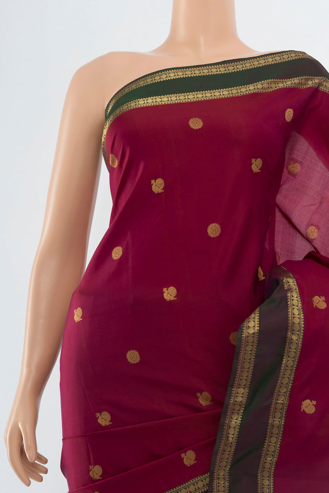 Border image of Purple Kanchipuram Silk Saree with Zari Butta on the body and Silk Border. 