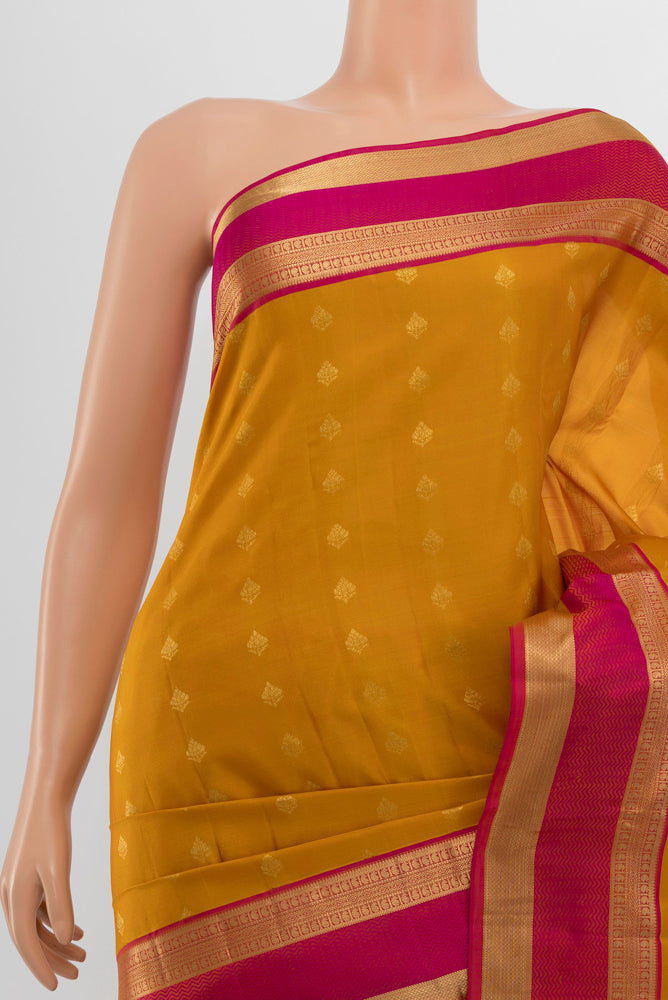 Border image of Mustard Kanchipuram Silk Saree with Zari Butta on the body and Silk Border. 