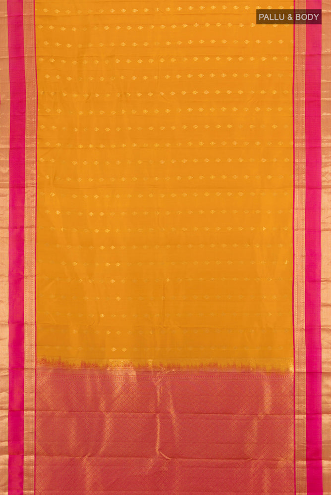 Flat view of Mustard Kanchipuram Silk Saree with Zari Butta on the body and Silk Border. 