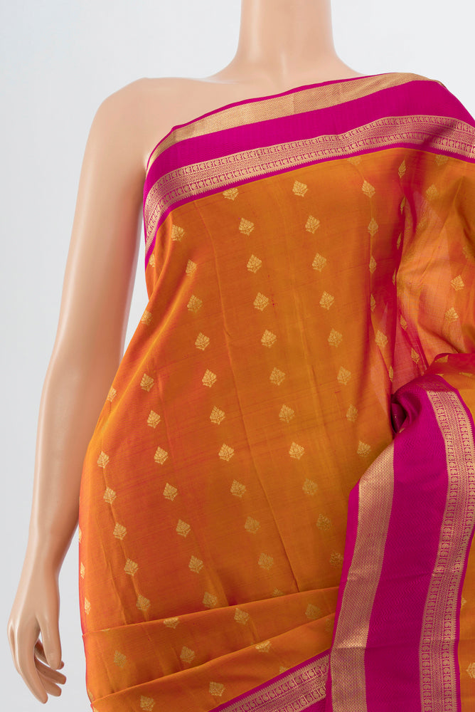 Border image of Golden Peach Kanchipuram Silk Saree with Zari Butta on the body and Silk Border. 