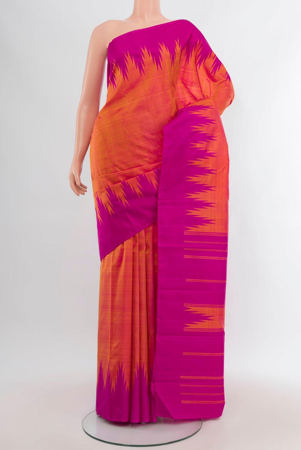 Orange Kanjivaram Silk Saree with Plain Body and Temple Border.  displayed on a mannequin