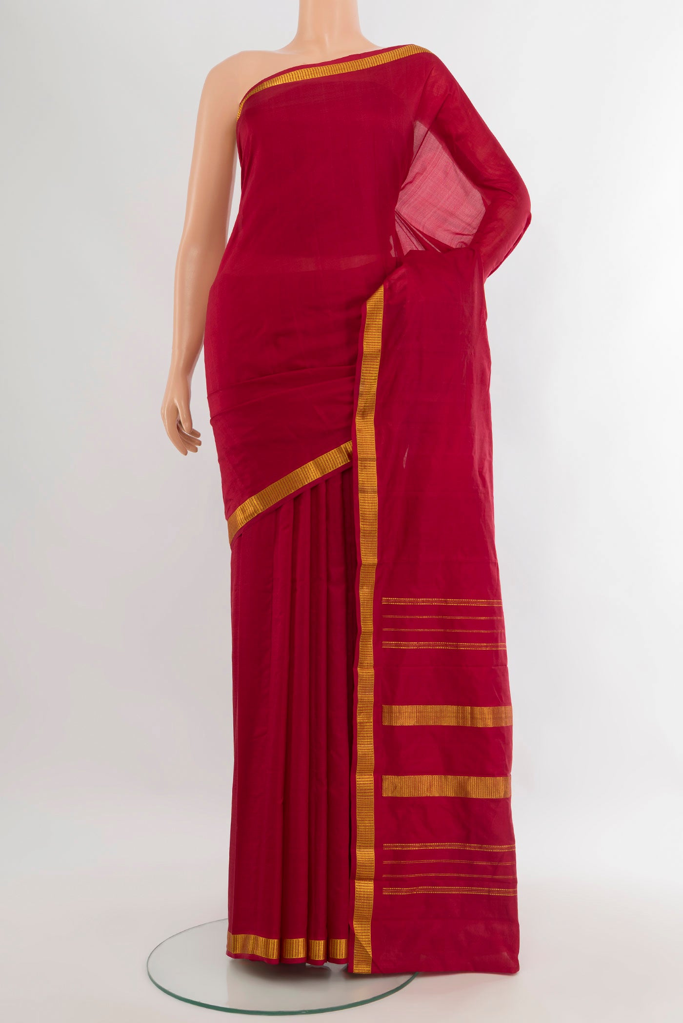 Maroon Kanjivaram Silk Saree with Plain Body and Zari Border.  displayed on a mannequin