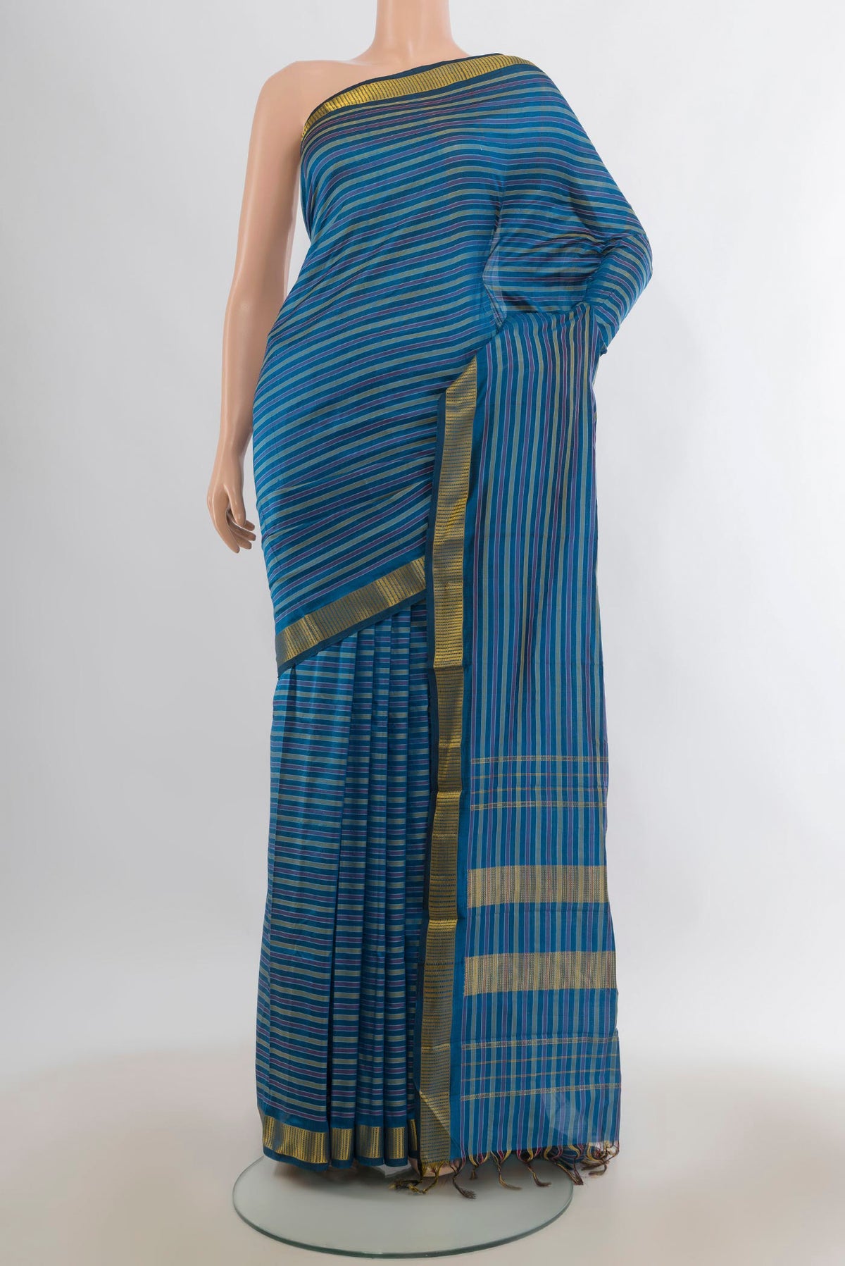 Pure Silk Blue Kanjivaram Saree with Stripes on the body and Zari Border.  displayed on a mannequin