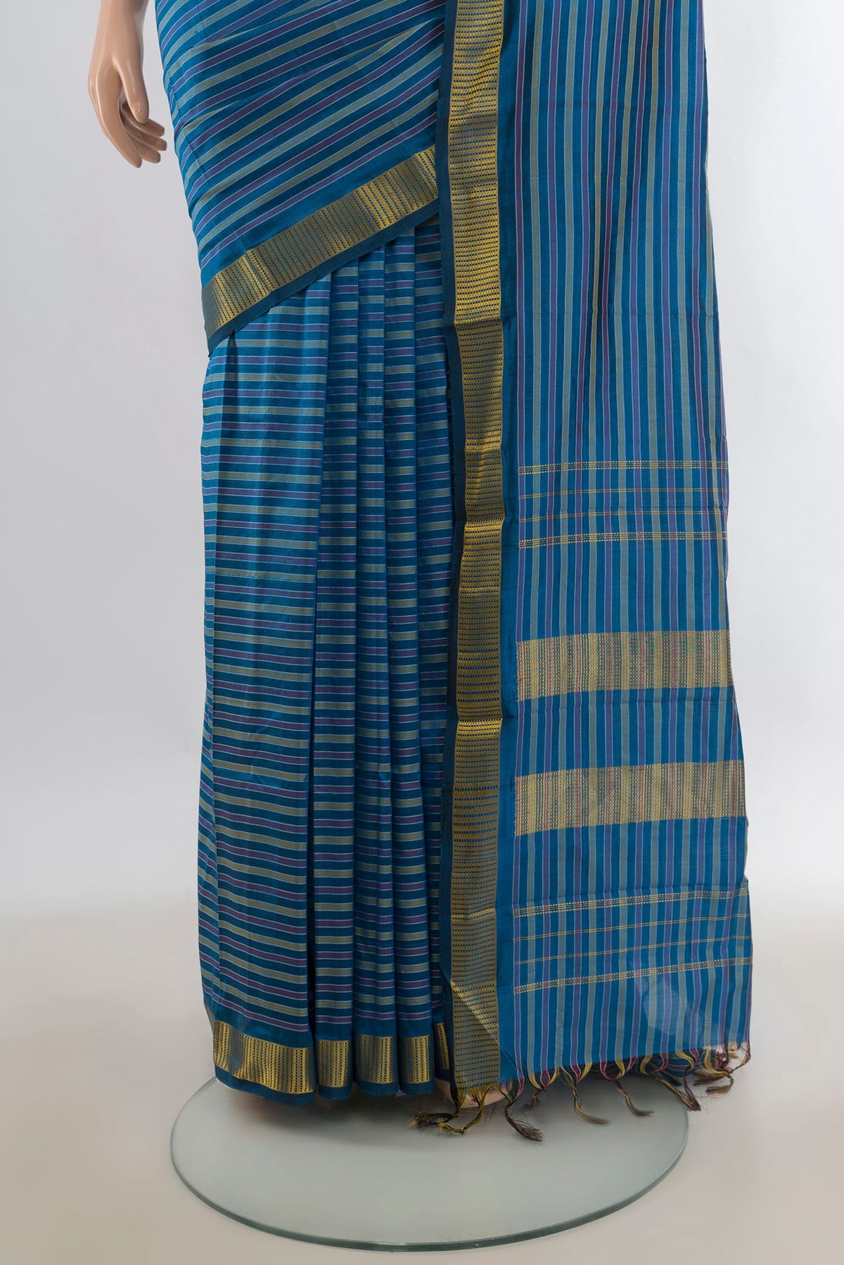 Pleats and pallu of Pure Silk Blue Kanjivaram Saree with Stripes on the body and Zari Border. 