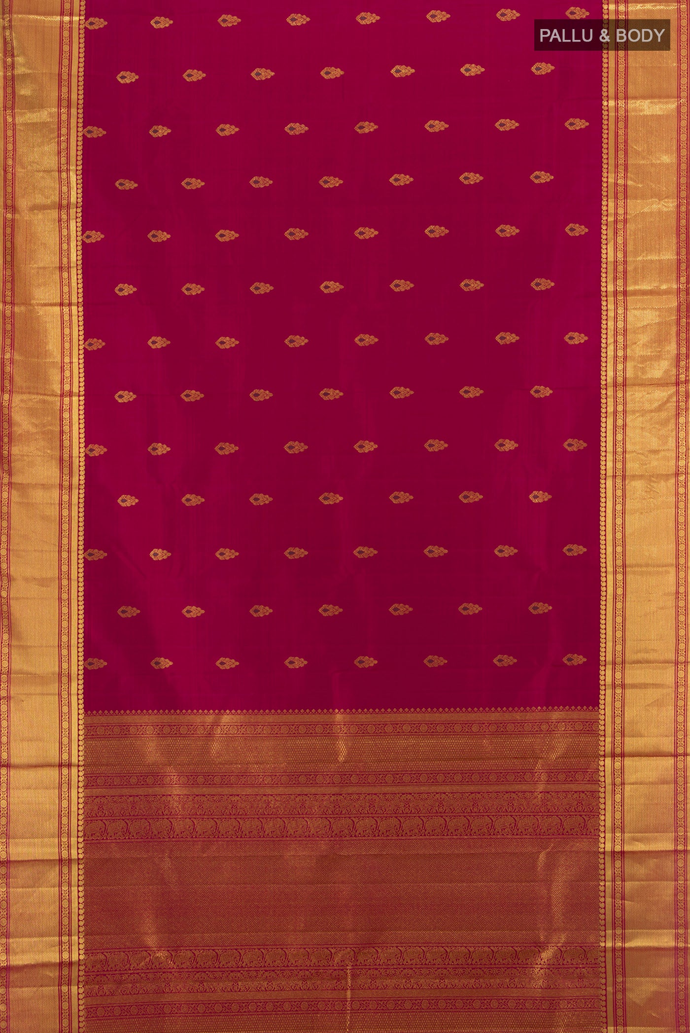 Flat view of Maroon Kanjivaram Silk Saree with Zari Butta on the body and Zari Border. 