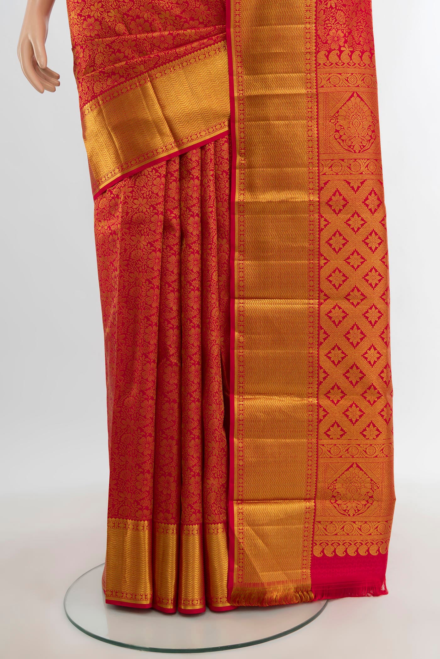 Pleats and pallu of Red Kanjivaram Silk Saree with Zari Brocade on the body and Zari Border. 