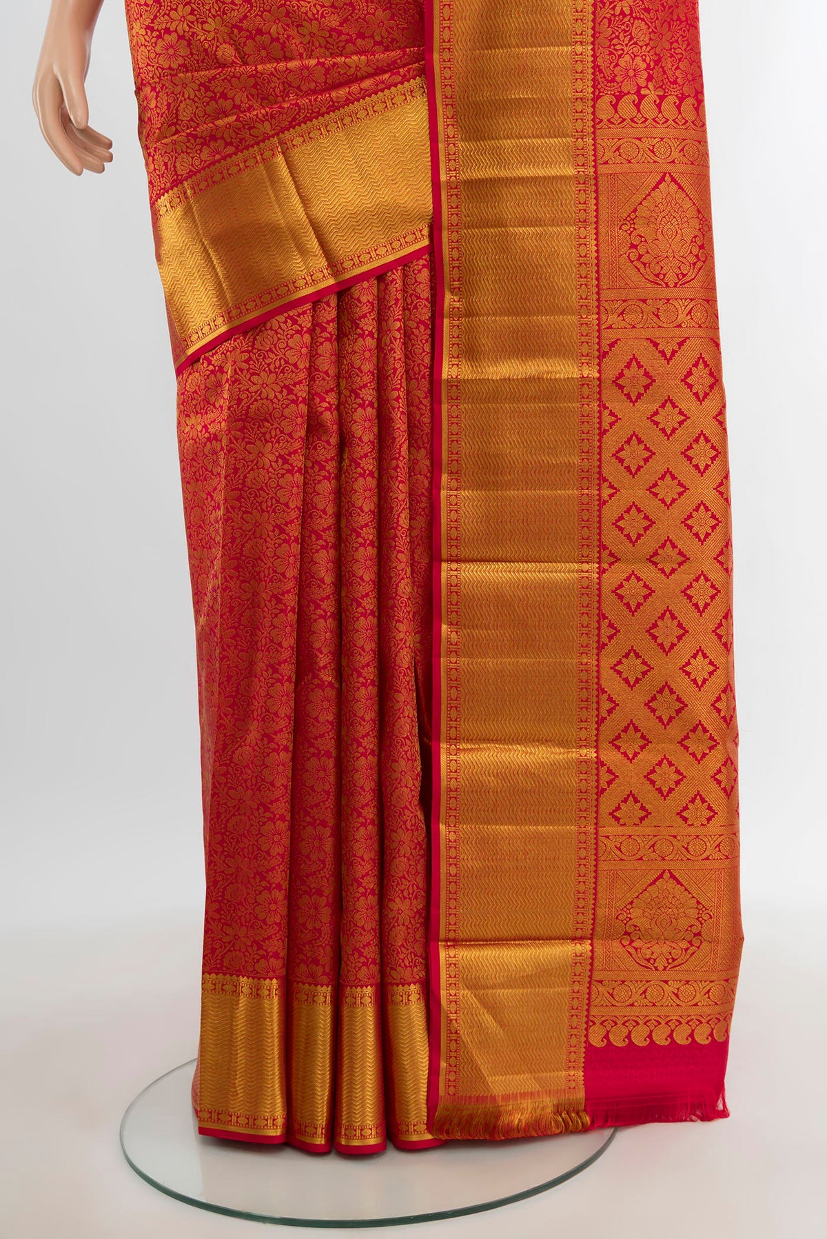 Pleats and pallu of Red Kanjivaram Silk Saree with Zari Brocade on the body and Zari Border. 
