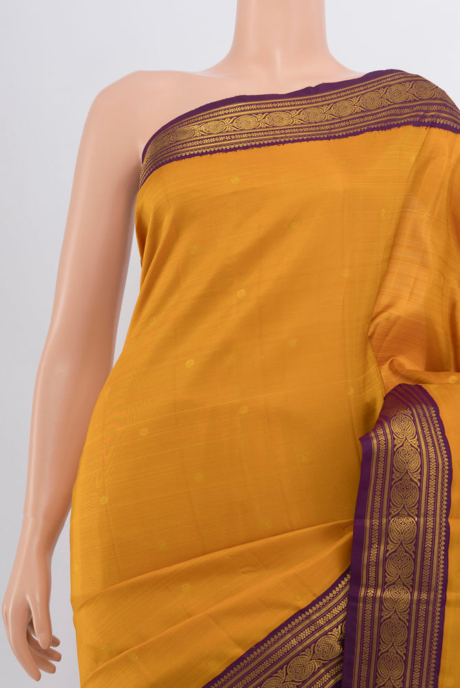 Border image of Mustard Kanjivaram Silk Saree with Zari Butta on the body and Silk Border. 