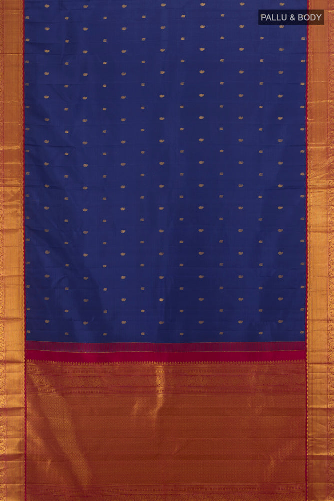 Flat view of Dark Blue Kanjivaram Silk Saree with Zari Butta on the body and Silk Border. 