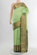 Pure Silk Pista Green Kanchipuram Saree with Zari Brocade on the body and Zari Border.  displayed on a mannequin