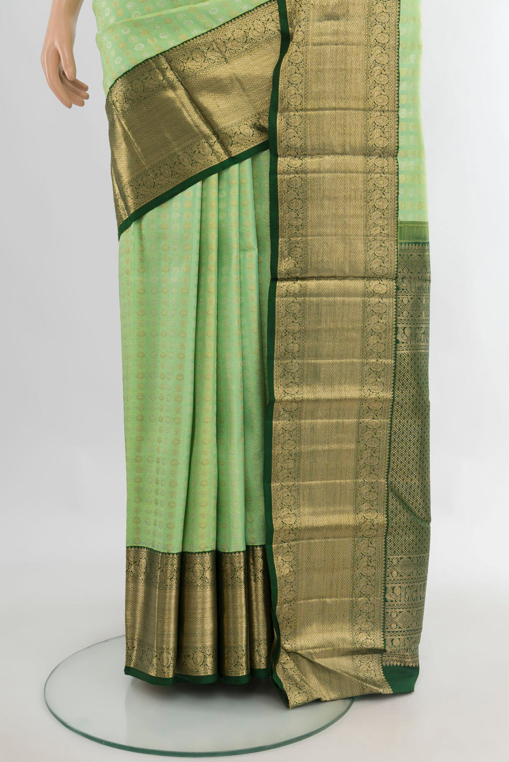 Pleats and pallu of Pure Silk Pista Green Kanchipuram Saree with Zari Brocade on the body and Zari Border. 