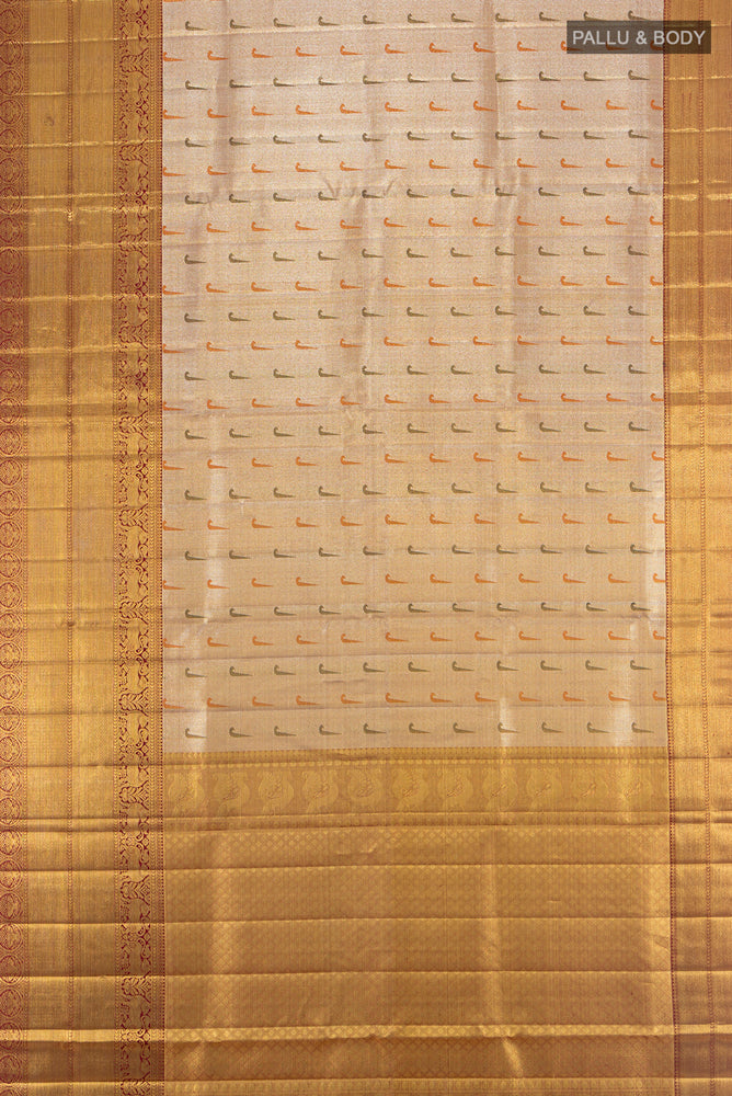 Flat view of Golden Kanjivaram Silk Saree with Zari Butta on the body and Silk Border. 